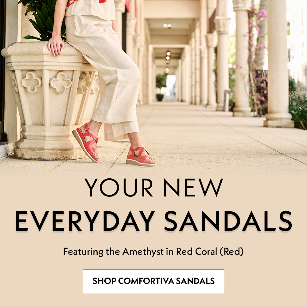 Your new everyday sandals. Featuring the Amethyst in Red Coral (Red). Shop comfortiva sandals. A woman wearing the amethyst sandals in red.